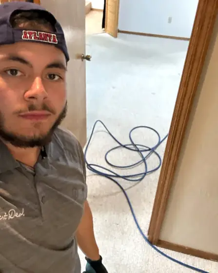 Angel, partner at Best Deal, on a carpet cleaning job