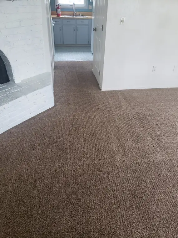 Living room by the fireplace, cleaned